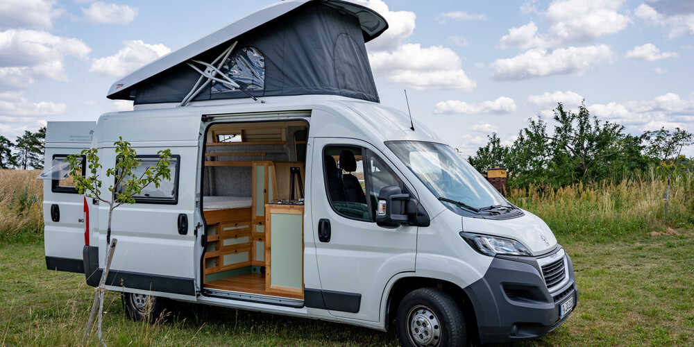 Camper Ausbau auf Peugeot Boxer L2H2<br>mit Aufstelldach